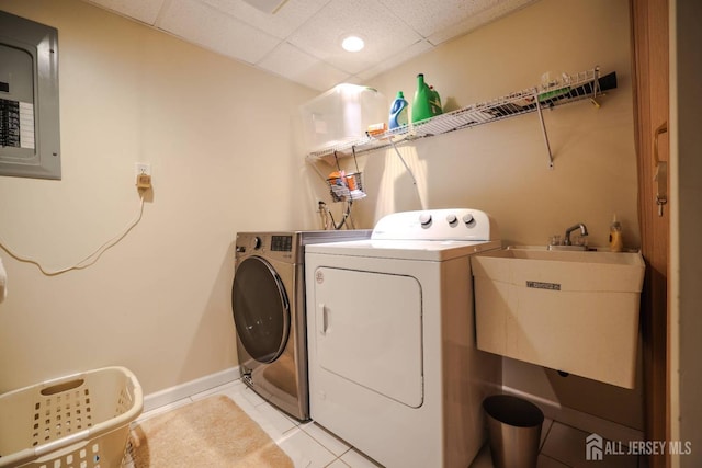 19 Crescent Rd, Old Bridge, NJ 08857 - laundry area featuring separate washer and dryer, electric panel, light tile patterned floors, and baseboards
