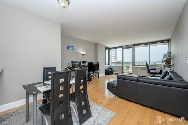 1 Spring St Unit 1206, New Brunswick, NJ 08901 - dining space featuring wood finished floors and an office area