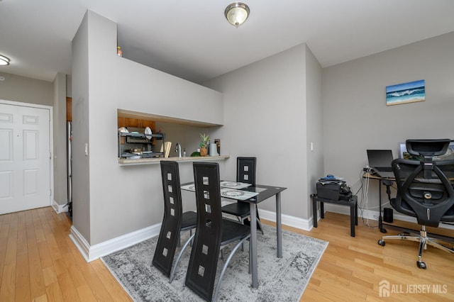 1 Spring St Unit 1206, New Brunswick, NJ 08901 - dining room with an office area and wood finished floors