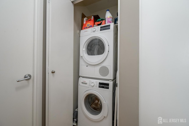 1 Spring St Unit 1206, New Brunswick, NJ 08901 - washroom with stacked washer / drying machine