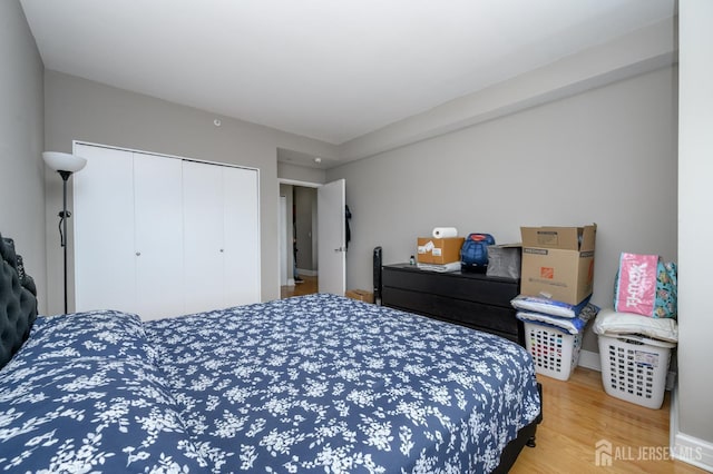 1 Spring St Unit 1206, New Brunswick, NJ 08901 - bedroom featuring a closet and wood finished floors