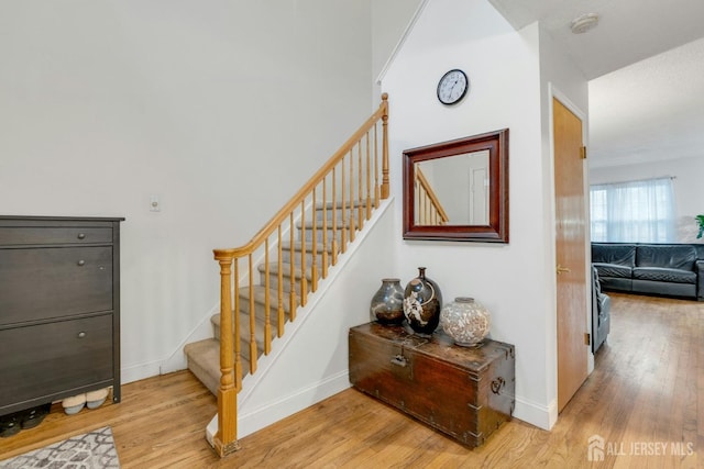 1 Pheasant Run, Edison, NJ 08820 - stairway featuring wood finished floors and baseboards