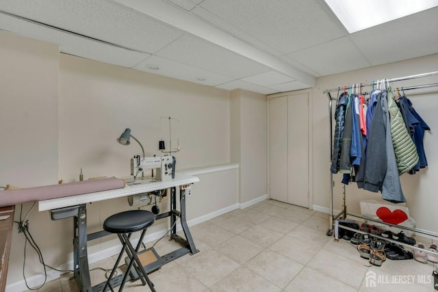 1 Pheasant Run, Edison, NJ 08820 - interior space with light tile patterned flooring, a drop ceiling, and baseboards