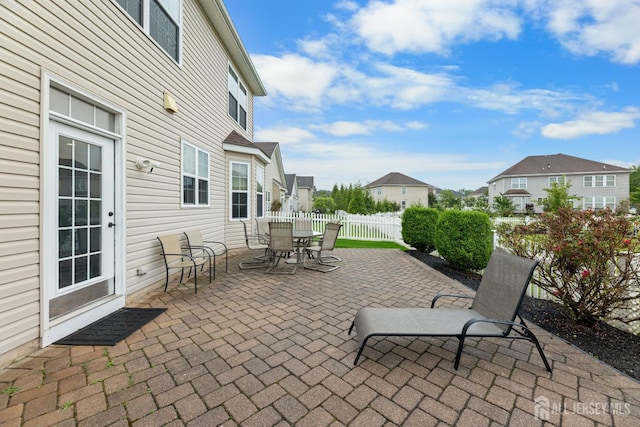 55 Dahlia Ct, Piscataway, NJ 08854 - view of patio / terrace with outdoor dining area and a residential view