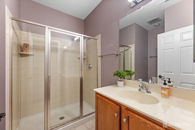 55 Dahlia Ct, Piscataway, NJ 08854 - bathroom featuring a stall shower, vanity, and tile patterned floors