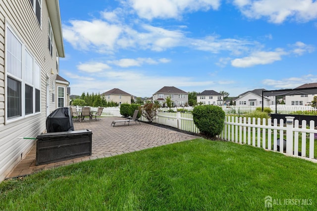 55 Dahlia Ct, Piscataway, NJ 08854 - fenced backyard with a residential view and a patio area