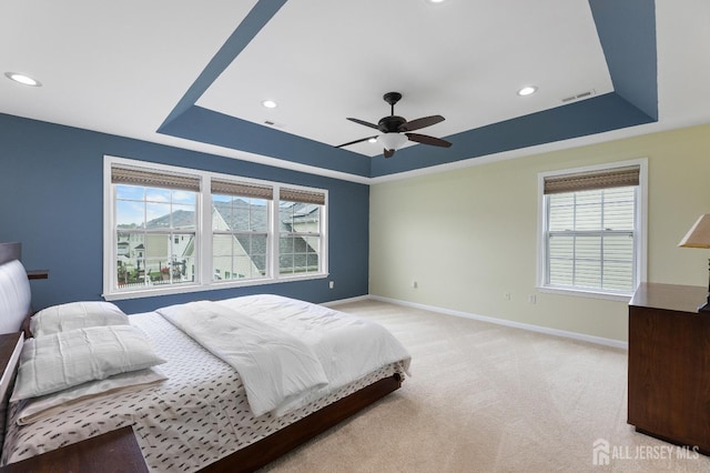 55 Dahlia Ct, Piscataway, NJ 08854 - bedroom with a raised ceiling, multiple windows, recessed lighting, and light colored carpet