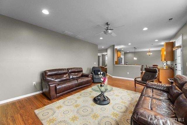 55 Dahlia Ct, Piscataway, NJ 08854 - living room with wood finished floors, a ceiling fan, and recessed lighting