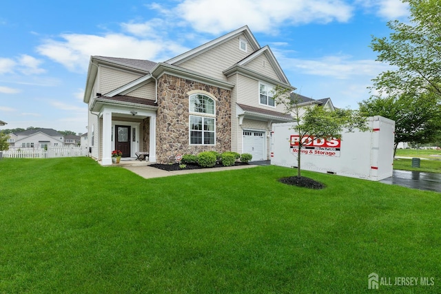 55 Dahlia Ct, Piscataway, NJ 08854 - view of front facade with stone siding and an attached garage