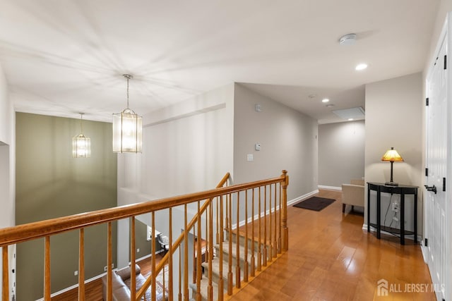 55 Dahlia Ct, Piscataway, NJ 08854 - corridor with an upstairs landing, wood finished floors, and recessed lighting
