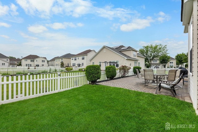 55 Dahlia Ct, Piscataway, NJ 08854 - fenced yard featuring a residential view and a patio