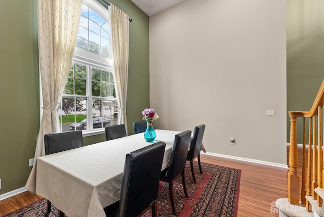 55 Dahlia Ct, Piscataway, NJ 08854 - dining space featuring wood finished floors and stairway