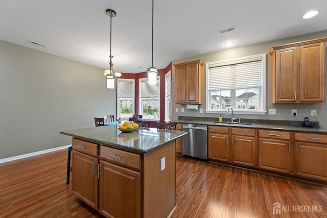 55 Dahlia Ct, Piscataway, NJ 08854 - kitchen featuring stainless steel dishwasher, dark wood-style floors, a center island, plenty of natural light, and recessed lighting