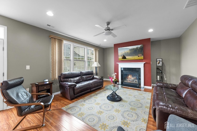 55 Dahlia Ct, Piscataway, NJ 08854 - living room featuring ceiling fan, wood finished floors, a glass covered fireplace, and recessed lighting