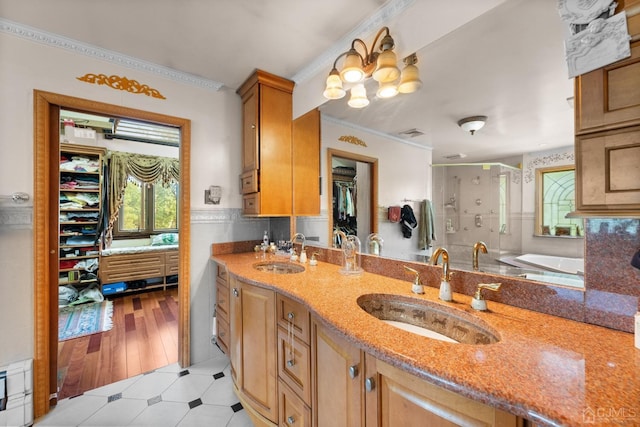 bathroom with vanity, separate shower and tub, and ornamental molding