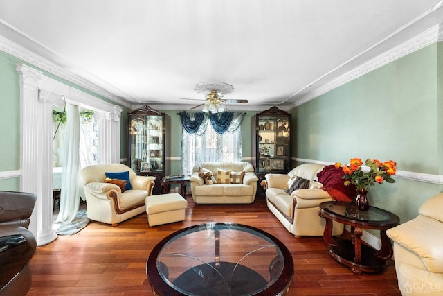 living room featuring crown molding and hardwood / wood-style floors