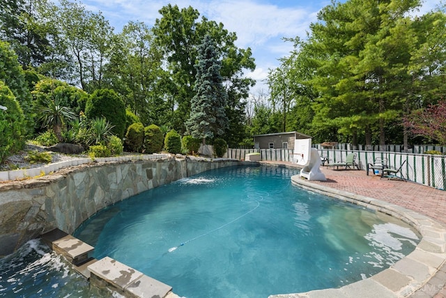 view of pool featuring a patio area and pool water feature