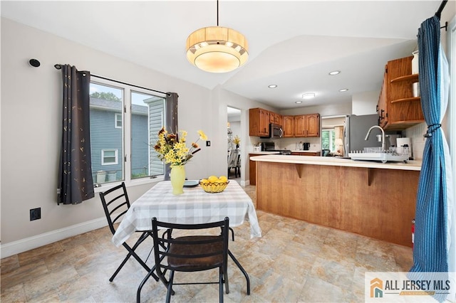 34 Connor Ave, Metuchen, NJ 08840 - dining area with stone finish floors, recessed lighting, and lofted ceiling