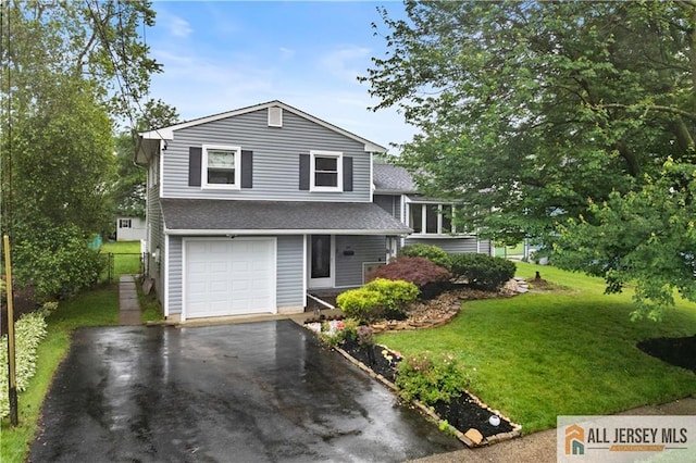 34 Connor Ave, Metuchen, NJ 08840 - split level home featuring driveway, a front yard, a garage, and roof with shingles