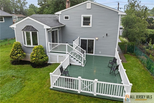 34 Connor Ave, Metuchen, NJ 08840 - back of property with a deck, a fenced backyard, and a chimney