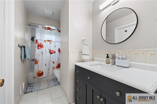 34 Connor Ave, Metuchen, NJ 08840 - full bath with vanity, tile patterned flooring, tile walls, and shower / tub combo with curtain