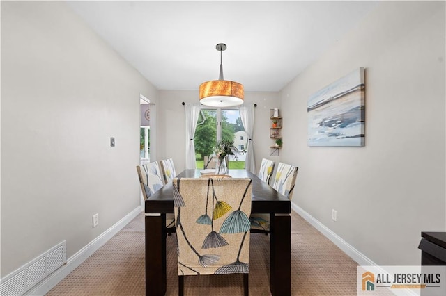 34 Connor Ave, Metuchen, NJ 08840 - carpeted dining room featuring baseboards