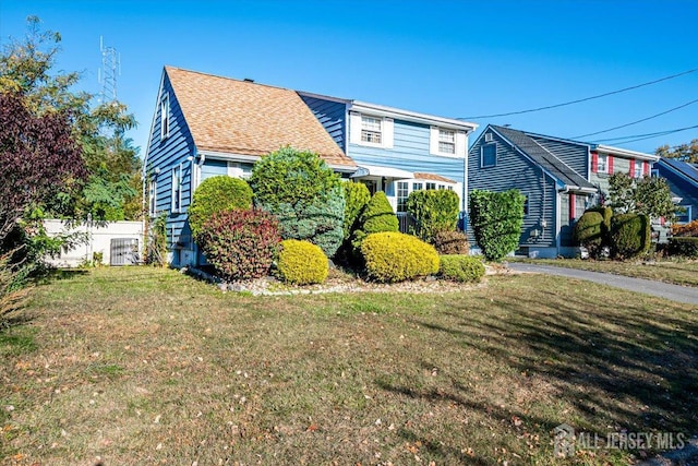 view of property exterior featuring a yard