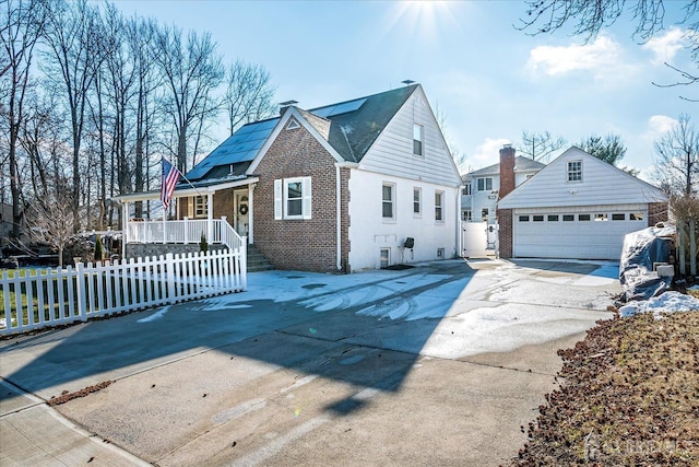 view of front of house with a porch and a garage