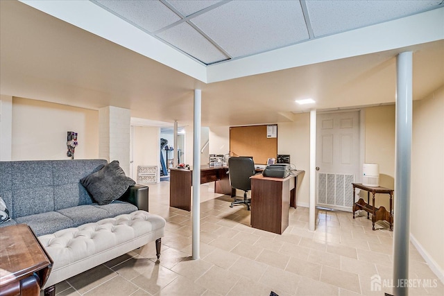 office area featuring a paneled ceiling