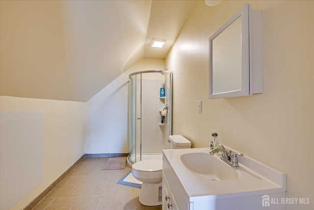 bathroom with vanity, lofted ceiling, a shower with shower door, and toilet