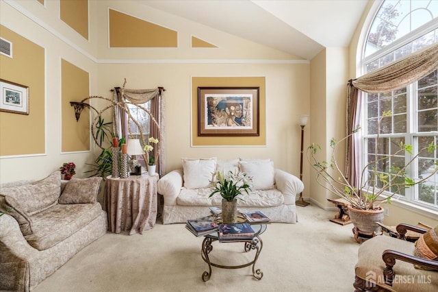 living room featuring carpet floors, visible vents, crown molding, and high vaulted ceiling