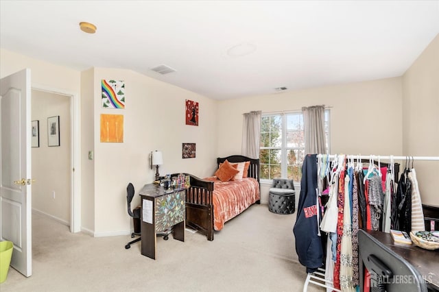 bedroom featuring light carpet, baseboards, and visible vents