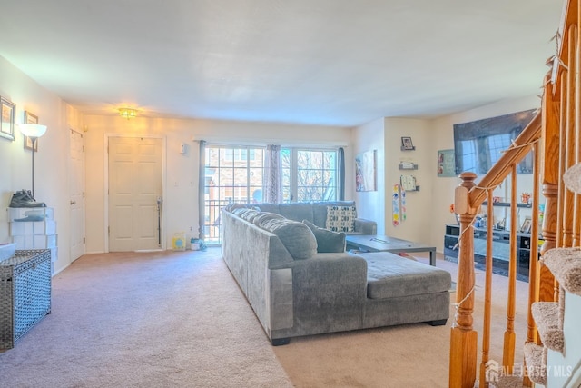 living room featuring light colored carpet