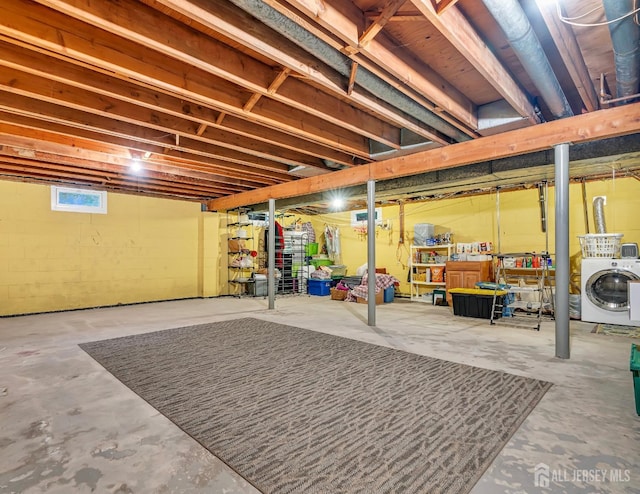 basement with washer / dryer