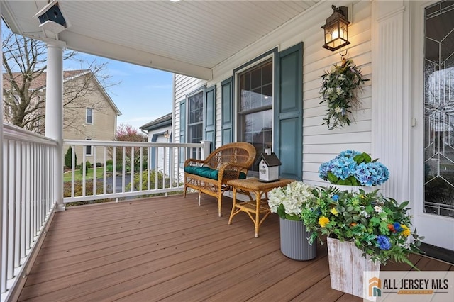 deck with covered porch