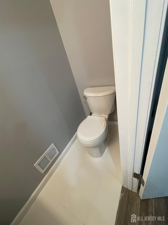 bathroom featuring toilet