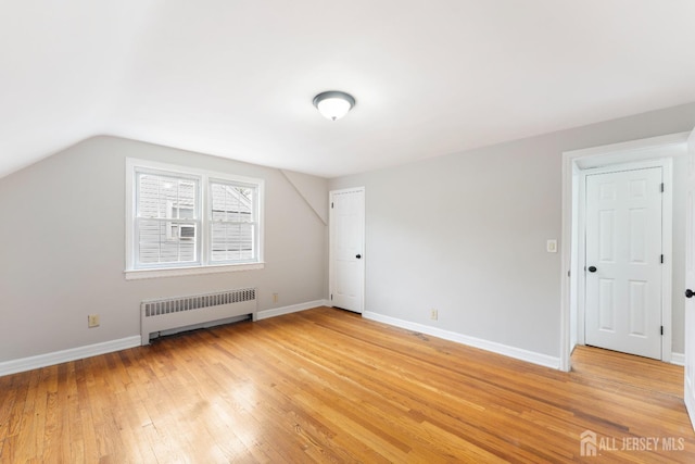 334 Hillcrest Ave, Plainfield, NJ 07062 - bonus room with radiator, light wood-type flooring, baseboards, and lofted ceiling