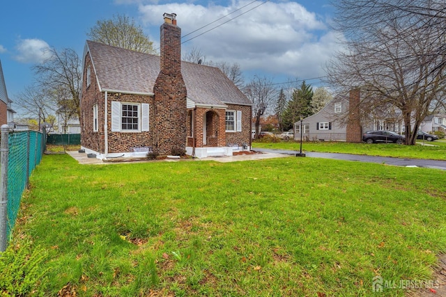 334 Hillcrest Ave, Plainfield, NJ 07062 - view of front of property featuring brick siding, roof with shingles, and a chimney