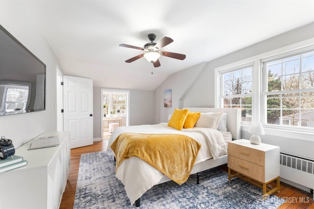 334 Hillcrest Ave, Plainfield, NJ 07062 - bedroom featuring radiator heating unit, wood finished floors, vaulted ceiling, ceiling fan, and ensuite bath