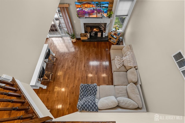 20 Mccormick Ave, Old Bridge, NJ 08857 - living room with a fireplace, wood finished floors, and stairway