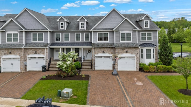 20 Mccormick Ave, Old Bridge, NJ 08857 - townhome / multi-family property featuring driveway, covered porch, an attached garage, and a front yard
