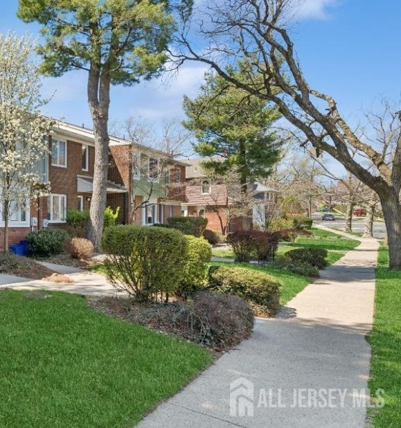 210 N 2nd Ave, Highland Park, NJ 08904 - view of property's community with a lawn