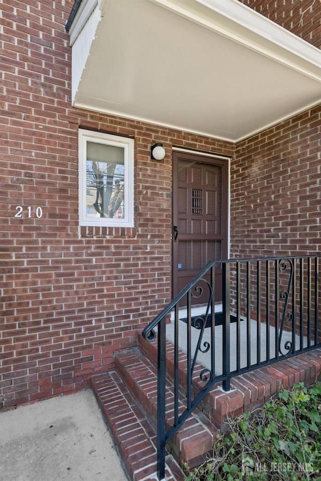 210 N 2nd Ave, Highland Park, NJ 08904 - entrance to property featuring brick siding