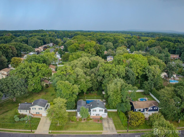 drone / aerial view of a heavily wooded area