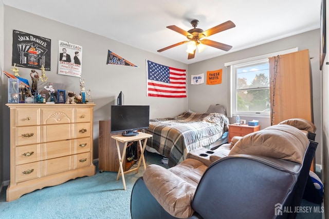 bedroom featuring carpet and a ceiling fan