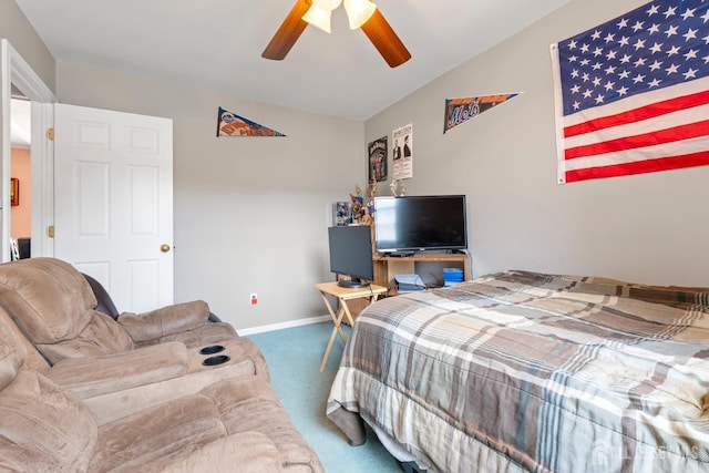 carpeted bedroom with baseboards and ceiling fan