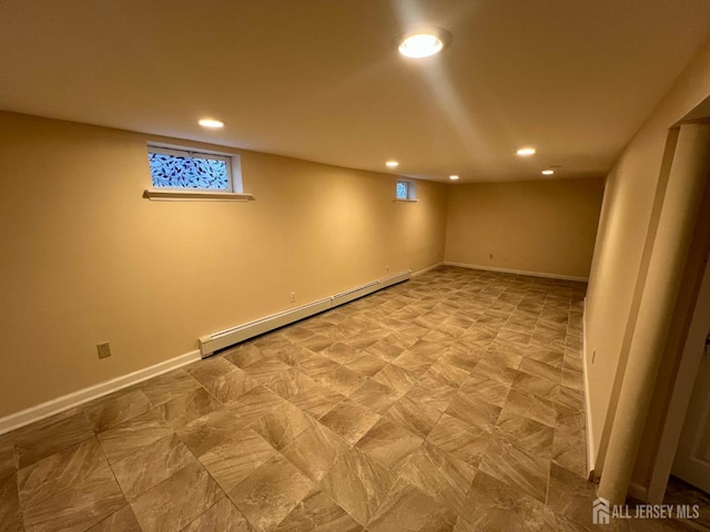 basement featuring baseboard heating