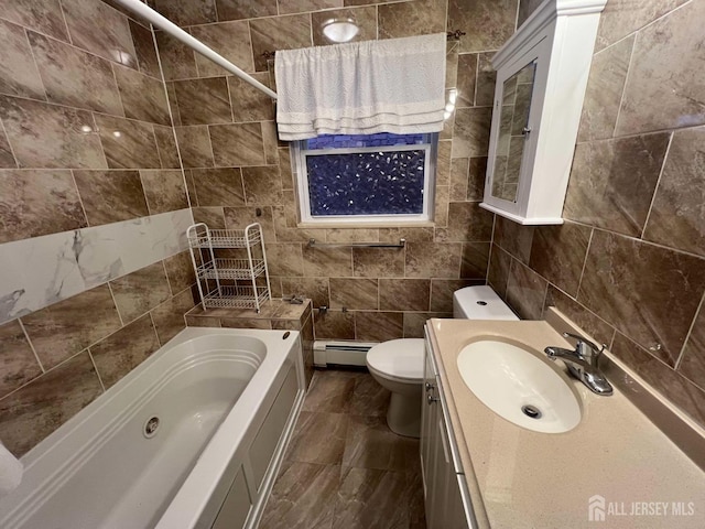 bathroom with vanity, toilet, tile walls, and a baseboard radiator