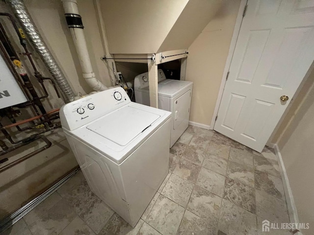 laundry area featuring independent washer and dryer