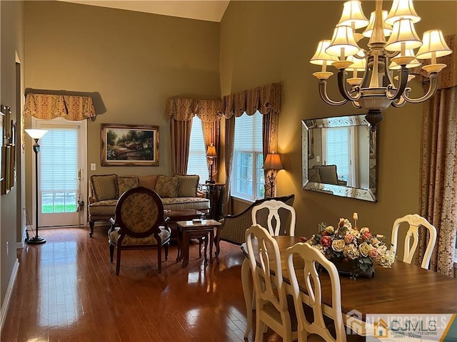 1 Silcox Pl, Franklin, NJ 08873 - dining room featuring a chandelier, hardwood / wood-style floors, and a high ceiling